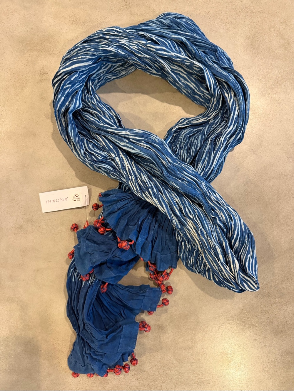 Anokhi Indigo Blue Crinkle Block Print Cotton Scarf with Red Pom Pom Trim